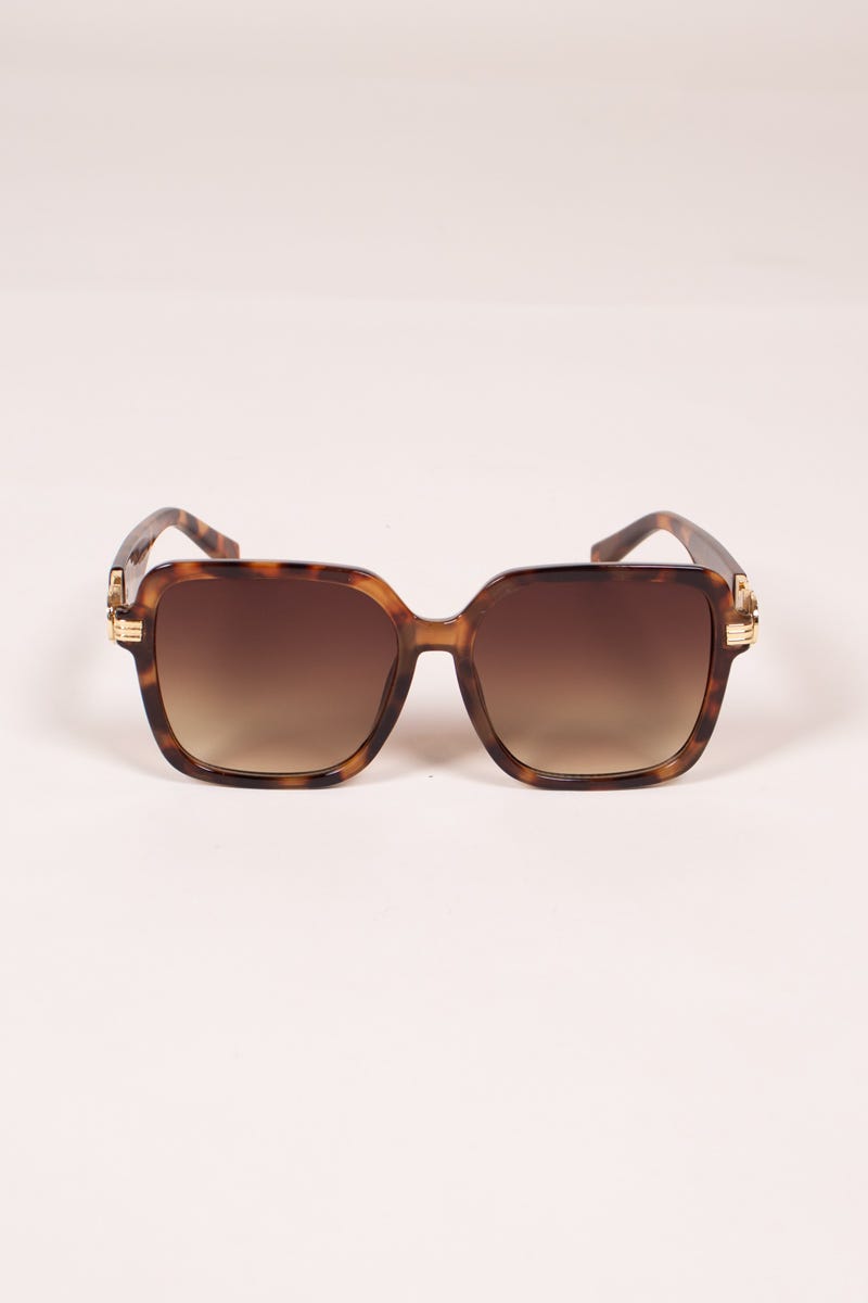 Sonnenbrille mit griechisch inspirierten Details Leopardenmuster