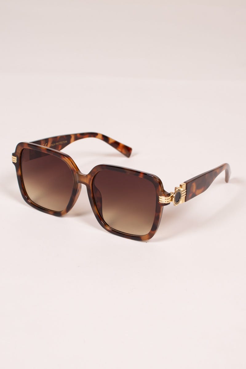 Sonnenbrille mit griechisch inspirierten Details Leopardenmuster