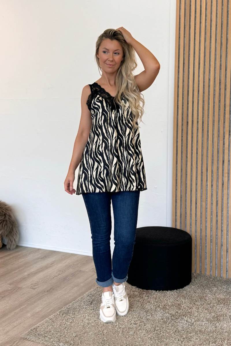 Spitzentop mit Animalprint Zebramuster