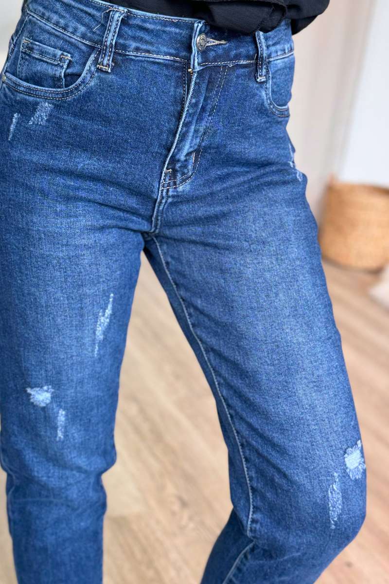 Hochtaillierte abgenutzte Jeans 