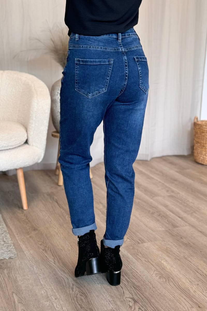 Hochtaillierte abgenutzte Jeans 