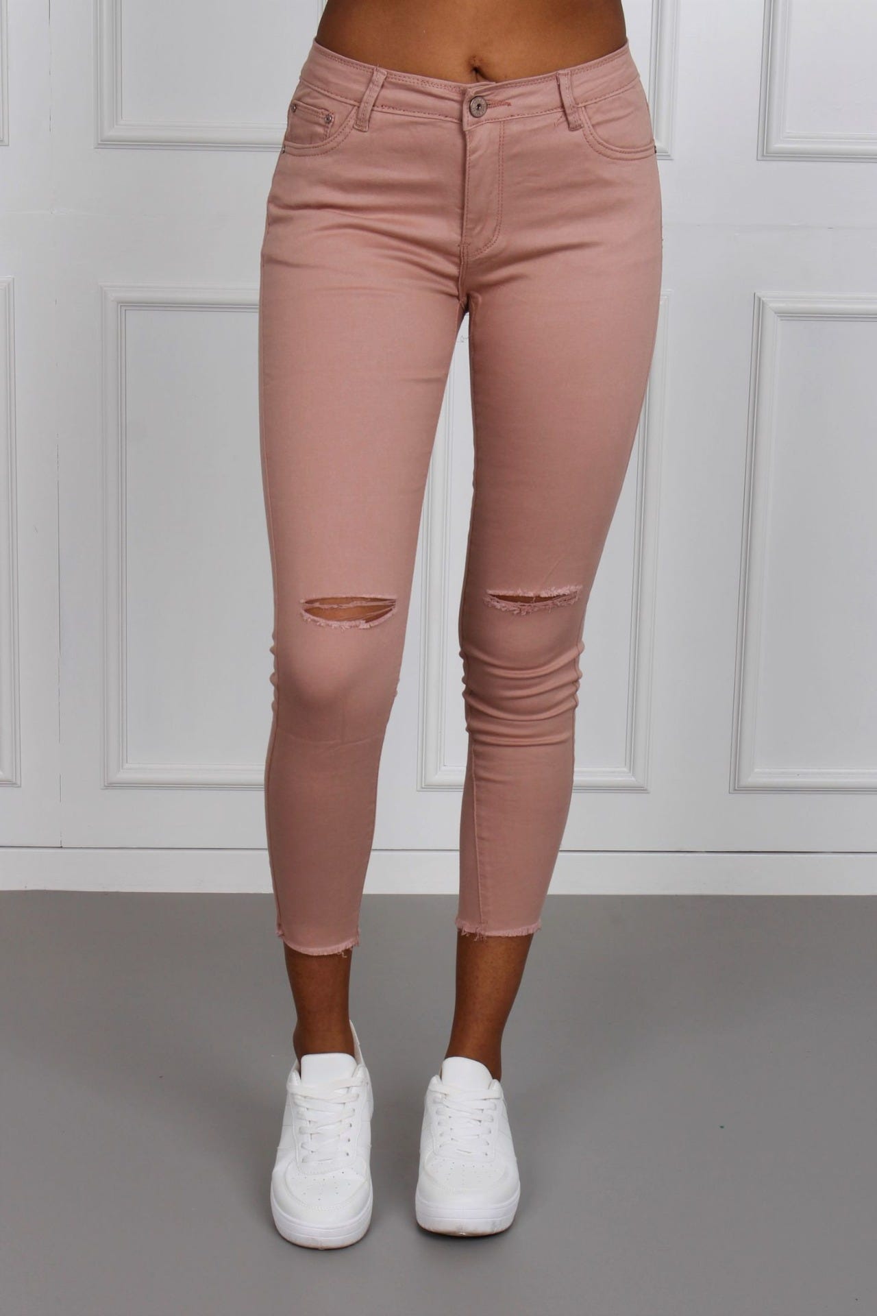 Jeans mit Rissen, rosa