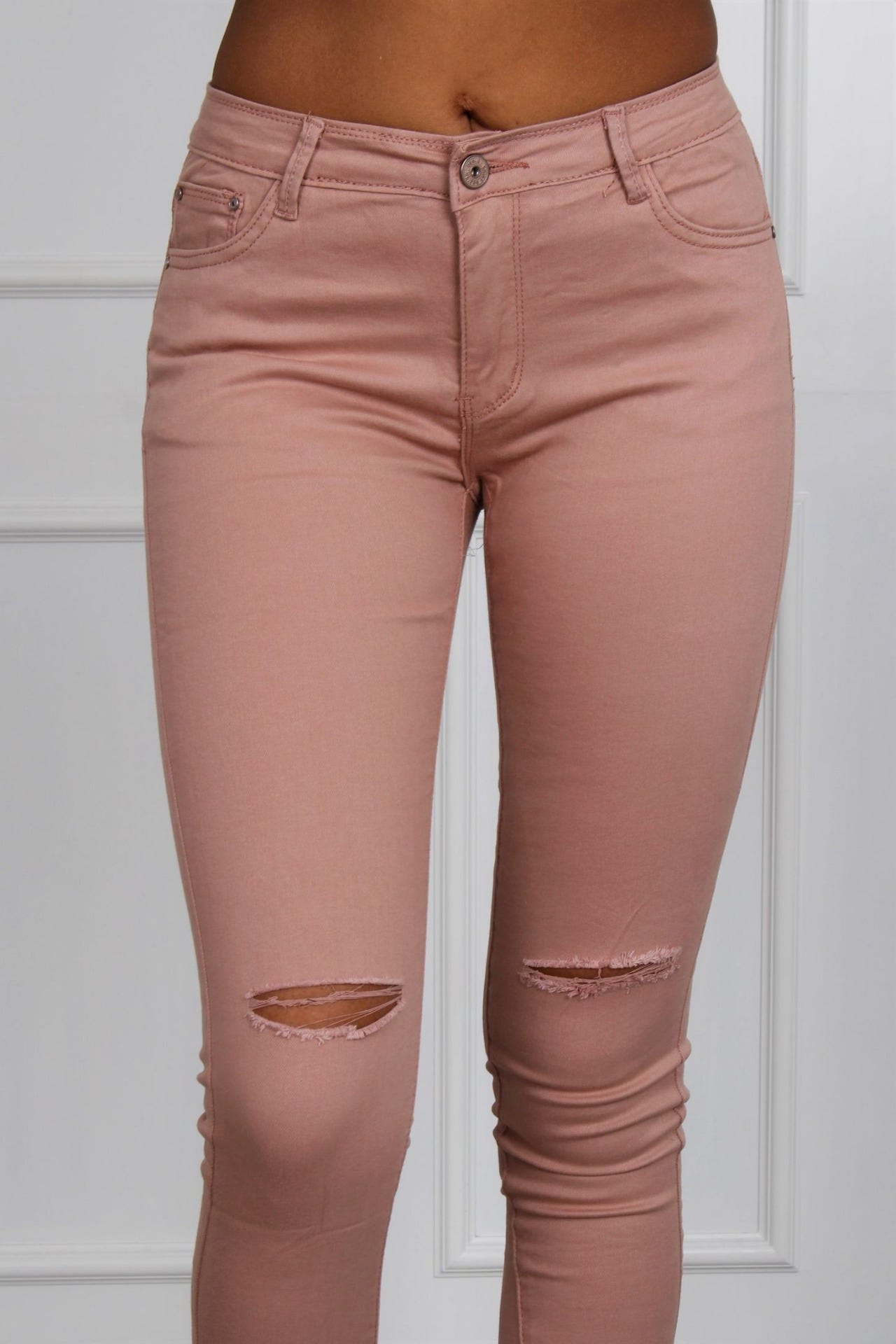 Jeans mit Rissen, rosa