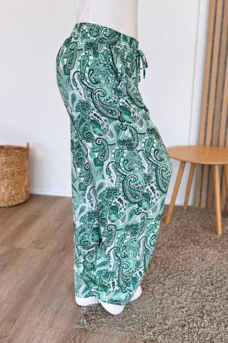 Elastische Hose mit Paisleymuster Grün