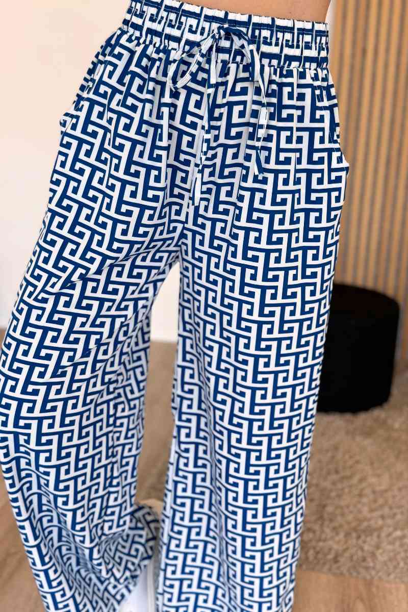 Elastische Hose mit weitem Bein und grafischem Muster Blau